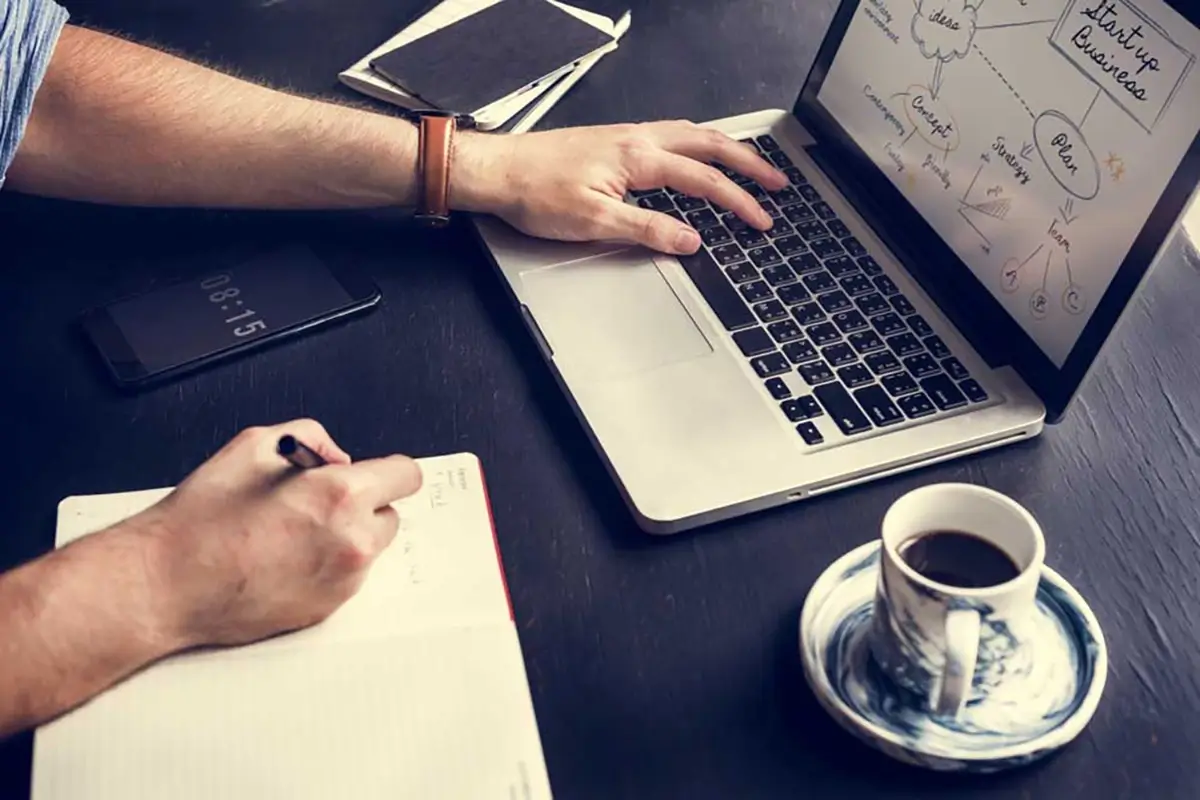 4 Study Habits Adults Can Still Develop Today 2 Man working on laptop with coffee