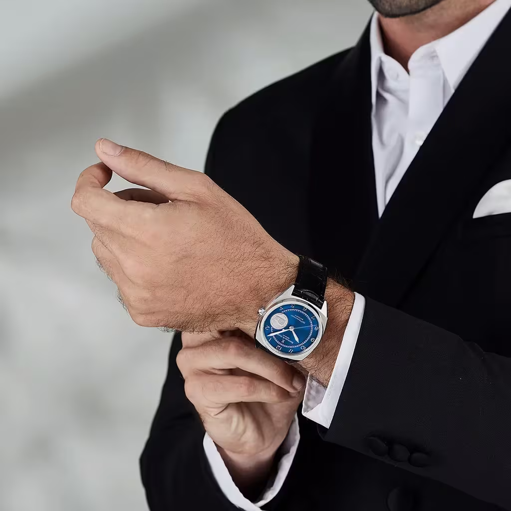 5 Things Your Bernhard H. Mayer Swiss Watch Says About You 4 Man wearing Bernard h mayer watch in a suit