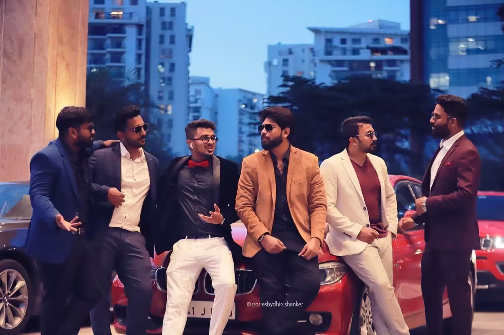 sapphire star ashik posing in front of car with team