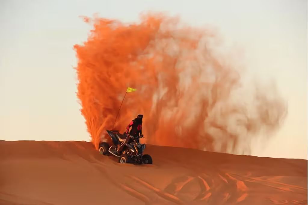Best Things To Do In Dubai When You Have 24 Hours 3 four wheeler motorcycle in desert.